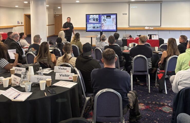 Joe Walker at Hampden Stadium in Glasgow talking carpets, flooring and window blinds to a packed conference room